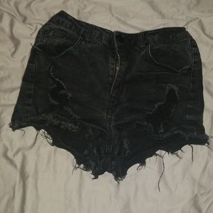 Ripped black shorts